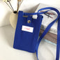 A fashionable single-shoulder bag made of wool